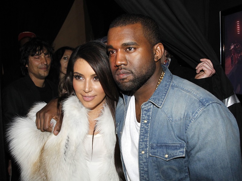 PARIS, FRANCE - MARCH 06: Kim Kardashian and Kanye West attend the Kanye West Ready-To-Wear Fall/Winter 2012 show as part of Paris Fashion Week at Halle Freyssinet on March 6, 2012 in Paris, France. (Photo by Eric Ryan/Getty Images)