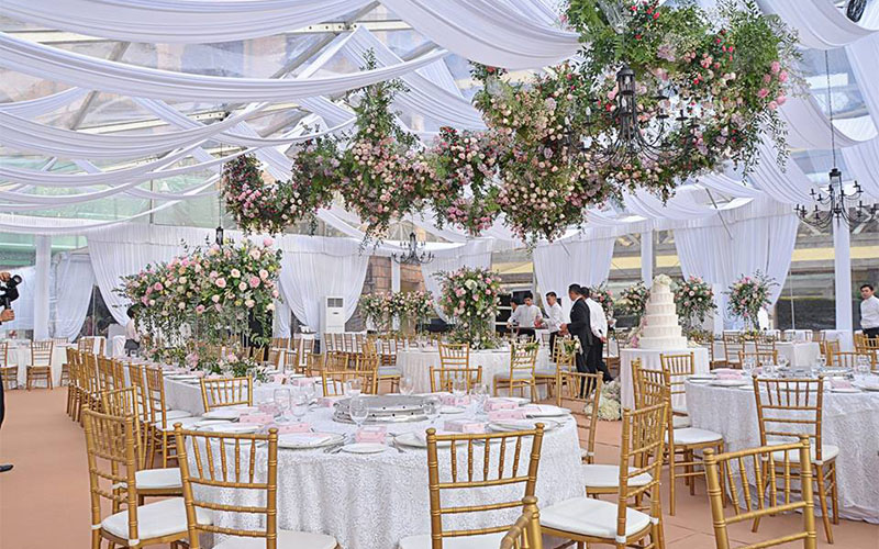 faliq and chrysies wedding venue white hanging florals
